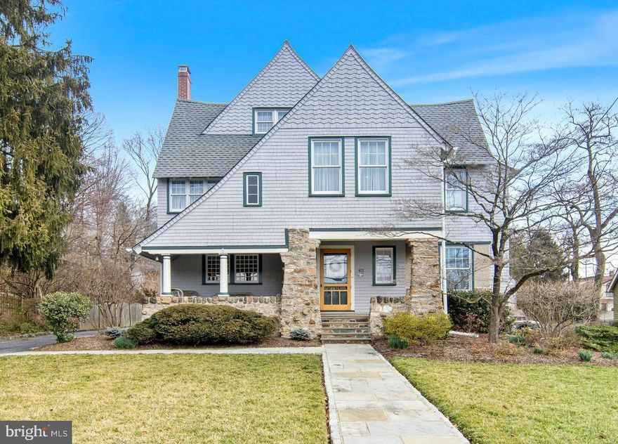 This warm and inviting 5+ bedroom, 3/1 bath Arts & Crafts style home is nestled in the heart of a coveted, walkable North Wayne neighborhood. This c.1890 property has been extensively renovated and expanded to incorporate a large Family Room near the expanded Kitchen and Breakfast Room, a very large Primary Bedroom with spacious private Bath, and many other upgrades. Gleaming new wood floors on the 1st and 2nd floor seamlessly blend the rear addition to the original home. The lower level of the addition incorporates a rare feature for historic homes… a very large basement with 8 ft. high ceilings! This unfinished space offers fabulous potential add’l living space for recreation, exercise, and more. The flagstone front walk leads to an inviting covered porch, overlooking the beautiful gardens. An extra-wide front-to-back Entrance Hall dates to a 1920’s renovation and provides wonderful flow for entertaining. You’ll love the large Living Room with a wall of built-ins and an amazing fireplace with Mercer tiles. Almost all windows in this home have been replaced, but the formal Dining Room still features 3 vintage leaded-glass windows. You’ll love preparing meals in the bright Kitchen, with newer stainless appliances: double oven (2021), refrigerator (2022), range hood (2022) and dishwasher (2023) and extensive cabinet and counter space. The Breakfast Room is open to the Family Room and has glass doors to the rear patio and yard. A gas fireplace and cozy window bench enhance the large Family Room, which is near the convenient Mudroom, Powder Room, and main floor Laundry Room. A leaded glass window accents the staircase to the 2nd floor, where you’ll find 5 spacious Bedrooms and 2 full Bathrooms. The Primary Bedroom has en suite Bath plus a very large walk-in closet and add’l closet space. The oversized Hall Bathroom has a tub/shower combo, is divided into two rooms for privacy, plus there is direct access to one of the Hall Bedrooms. Up on the 3rd floor are a Playroom and a Storage Room – both with closets, and a renovated Hall Bathroom with stall shower. The owners have taken meticulous care of this property and it shows! The 2-car Garage was expanded and widened so that it easily accommodates 2 vehicles plus bikes and yard gear. Newer systems: HVAC (2017/2018), hot water heaters (2020/2022), gutters (2022), sewer line (2023), Living Room fireplace liner (2023), front porch columns (2023), new paint in all bedrooms (2023), generator, and refinished front porch floor (2023).  Enjoy a warm sense of community with neighborhood events throughout each year such as progressive dinner, holiday events, a chili cook-off, and the annual soap box derby: all organized through the North Wayne Protective Association, the oldest civic association in the country. Ideally located in a picturesque neighborhood, this home is just moments away from renowned Radnor Schools, train, shopping, restaurants, and parks in the vibrant town of Wayne. Convenient access to the Blue Route, Center City and the Airport. Don’t miss the chance to make this house your home!