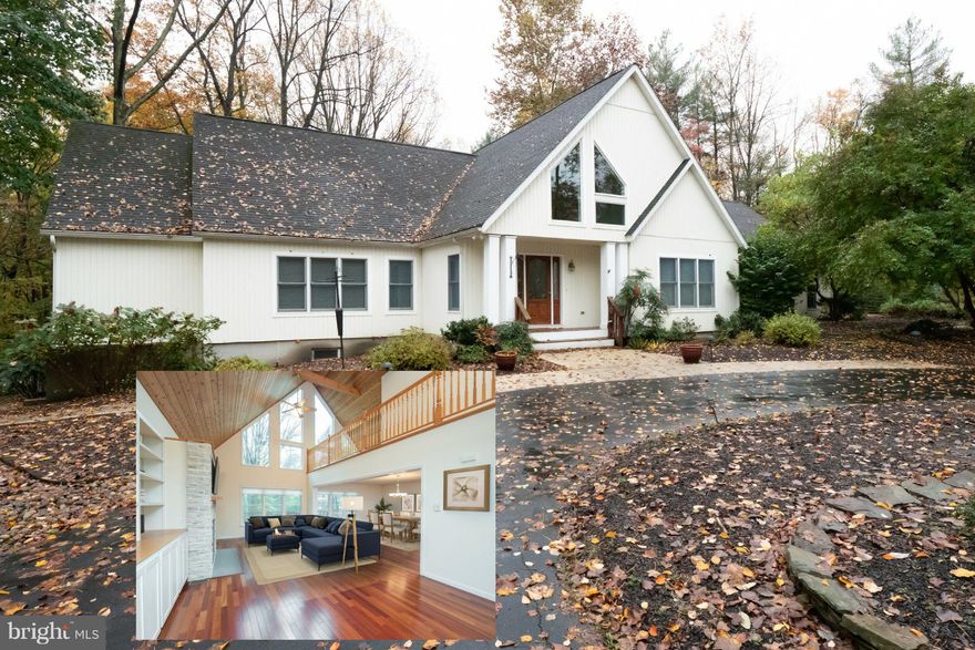 Amazing contemporary home in park-like setting in Crownsville.  Dramatic 2-story cathedral wood ceiling in Living Room  with stone covered fireplace and built-in cabinets. Gourmet kitchen with high-end appliances, double wall ovens, wine fridge and tons of cabinet/counter space. Main level master suite with sitting room, access to screened porch, his/her walk-in closets and spa-like bathroom.  Upstairs boasts 2 spacious bedrooms with ensuite bathrooms  and large storage room with potential to be another bedroom. Fully finished basement with wine cellar/tasting area and workshop.  3 car garage, rear deck and beautiful landscaping complete this must see property.