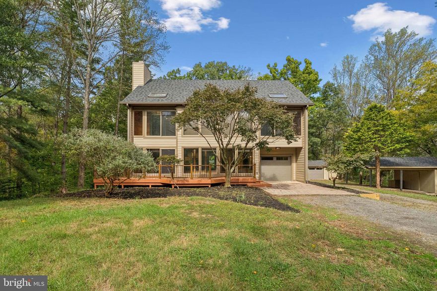 Experience the perfect blend of sustainability, luxury, and family-friendly living in this rare Solar Envelope home on over 10 acres in Leesburg. Designed to harness natural sunlight and ventilation, this innovative home maintains year-round comfort while lowering energy costs, offering bright and airy living spaces throughout. Fully renovated, it features a brand-new roof, two new HVAC systems, new hot water heater, updated garage siding and equipment, and a new pond pump.
The open main level showcases a new chef’s kitchen with quartz countertops, oversized island, backsplash, custom cabinetry, and high-end stainless steel appliances, flowing seamlessly into spacious living areas with LVP flooring, fresh paint, and modern lighting. Upstairs, you’ll find 4 generous bedrooms and 2 fully remodeled bathrooms with porcelain tile, vanities, and upgraded showers. The finished lower level provides flexible space for a family room, media area, home office, laundry, and abundant storage.
Step outside to enjoy a large deck, peaceful pond, detached 2-car garage that can double as a workshop, multiple storage sheds, a playground, and a scenic walking trail across the backyard. Perfectly located near Creighton Farms, major highways, and shopping centers, this home offers a rare opportunity to embrace eco-conscious living without compromising on luxury, convenience, or space for family and recreation.