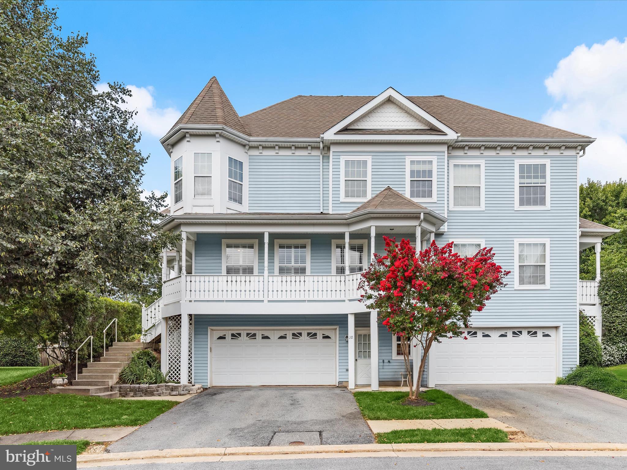 Tucked away in the sought-after gated community of Goldsborough Manor, this three-level end-unit townhome offers five bedrooms and three and a half bathrooms. A welcoming wraparound porch greets you on arrival and inside, the foyer includes a coat closet and half bathroom. Hardwood floors, crown molding, and custom plantation shutters enhance the main level, which flows seamlessly for both everyday living and entertaining. The open living and dining rooms lead to an eat-in kitchen with stainless steel appliances, granite countertops, tile backsplash, 42-inch cabinets, an island with seating, and a pantry. A breakfast nook provides a spot for casual meals, while the family room opens directly to the porch. Upstairs, the spacious primary bedroom features a walk-in closet and private ensuite bathroom with a tub and separate walk-in shower. Two additional bedrooms, a full bathroom, and a convenient laundry closet complete this level. Downstairs, the lower level expands the living space with a sitting room and sliding glass doors to the ground-level patio. Two more bedrooms, one of which has a gas fireplace, a brand new renovated bathroom with a walk-in shower, and access to the two-car garage complete this level. Set within a private enclave just off Reisterstown’s Main Street, this home is moments from shopping, dining, and only five minutes to I-795.