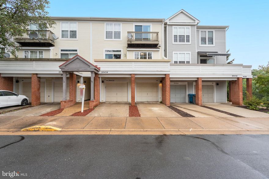 You will not want to miss this amazing opportunity in Ashburn Village. This home features 3 bedrooms and 2 full and 1 half bath. Lower level and main level feature new LVP flooring. Main level features living room with gas fireplace, dining room, half bath and updated kitchen. Walk out from living room slider onto deck. Upper level features 3 bedrooms and 2 full baths. Primary bedroom opens to small balcony. All baths beautifully updated. Lower level features one car garage and laundry / utility room. Refrigerator 2 years. Roof installed August 2023. HVAC 3 years. Hot water 2 years. 1 car garage and parking for 1 car in driveway. Low HOA includes all the amazing amenities Ashburn Village has to offer. Come fall in love!