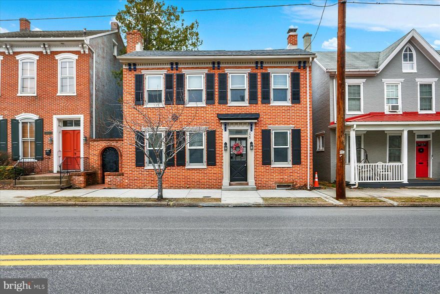 Welcome to 220 South Market Street, a beautifully updated home that seamlessly blends charm, character, and modern elegance. This fully remodeled residence offers a unique combination of classic features and contemporary style, making it an ideal place to call home.
The main house features a bright open kitchen with rich blue cabinetry, gold hardware, brand new granite countertops, tile backsplash and modern light fixtures, creating a stylish and inviting atmosphere. The two remodeled full bathrooms showcase sleek, contemporary finishes, while the open floor plan enhances the flow throughout the living spaces. First floor offers a living room and a cozy family room with a wood stove and hardwood floors adds warmth and comfort, and the second floor features all-new carpeting. Fresh paint throughout ensures every room feels bright and updated. Don’t miss the private balcony, offering a perfect spot for morning coffee or evening relaxation.
The detached office/studio is an ideal space for work or creativity, complete with its own gas fireplace, half bathroom, and kitchenette for added convenience. This private retreat provides the perfect balance of functionality and comfort. This space could also work as a "chill space".
Outside, you’ll appreciate the brand-new roof and low-maintenance brick exterior, providing both durability and curb appeal. The elegant wrought iron gate opens to a beautifully landscaped backyard with a covered rear patio, ideal for outdoor relaxation and entertaining.
Convenience is key, and this home offers two off-street parking spaces, ensuring parking is always a breeze. Located just a short walk from downtown Mechanicsburg, you'll have easy access to shops, restaurants, schools, and major highways.
220 South Market Street is a rare find, combining classic updates with modern living in a highly desirable location. Don’t miss your chance to experience all this home has to offer—schedule your showing today!