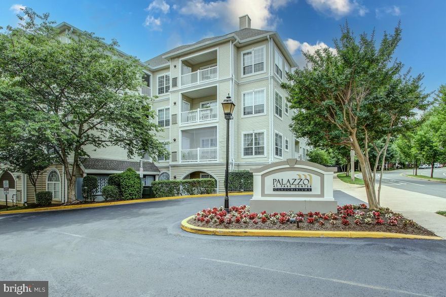 The most wonderful floor plan that Palazzo at Park Center has to offer!! Extra large TOP FLOOR private corner unit  with vaulted ceilings and wonderful sense of SPACE! Floor to ceiling stone fireplace!! SO pretty!  Sun-filled, spacious and beautifully presented. Huge open feel unique to this rarely available floor plan. Vaulted ceiling with recessed lighting in large living room opening to balcony - which overlooks a lovely courtyard, trees and amazing sunsets! The feel is inviting, airy and livable. Open kitchen with granite breakfast bar, stainless appliances, subway tile and custom cabinets. Beautifully renovated, stunning hardwood floors. High ceilings and vaulted ceilings throughout.  Two LARGE bedrooms with large walk in closets. Primary bedroom with ensuite bath.  Two full baths. Quiet  and special. Fabulous large outdoor pool, great gym, locker rooms, clubhouse, meeting rooms, and lovely gazebo. Wonderful community in great setting!  Open Sunday 1-4.