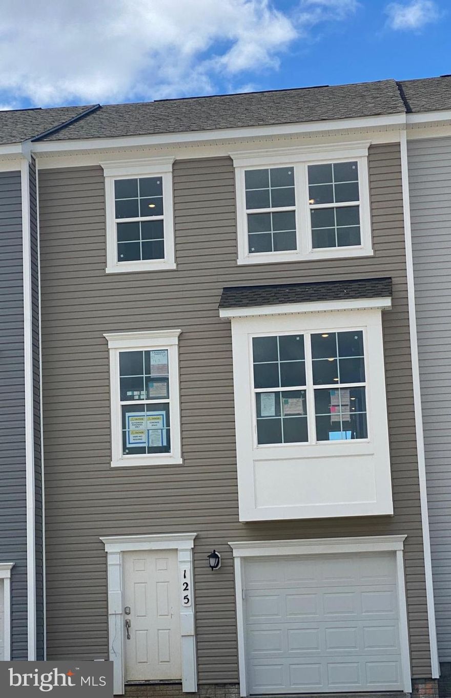 **Brand new townhome with Deck**
Description: This townhome have 3 levels, a 1-car garage, and an open floor plan. 1963 FINISHED SQUARE FEET!!  The lower and main levels will have luxury vinyl planking, stainless steel appliances and granite countertops in the kitchen, finished basement ,automatic garage door opener and Connected Homes by Lennar (R) features, including a Ring Video Doorbell. This community(Senseny Village ) is situated only a few minutes from old town, where you can enjoy the unique shopping and dining Winchester has to offer.