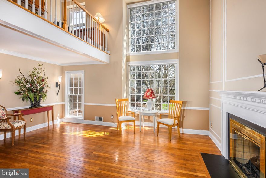 OPEN SUN 4/13, 1-3PM!  Welcome to this impeccably maintained and updated Dutch Colonial home, offering 3 BR, 3.5 BA, and a prime location in the highly sought-after Copenhaver neighborhood. Originally a builder's model home, this property masterfully blends elegance with exceptional architectural design. Within walking distance to Cold Spring ES,  and just 3 houses away from  middle and high SCHOOL BUS STOP at Falls Chapel/Copenhaver intersection, this home features a 2-story open living room, an upstairs open loft/office, and a distinctive exterior with a breezeway.  A charming cupola, complete with a weather vane, crowns the two-car garage.    A host of upgrades include stunning bathrooms, new roof (2023 - CertainTeed Landmark Architectural Designer Series – with installer 7-year/8-month remaining warranty) with 6" gutters and leaf guards for long-lasting durability, insulated flooring in both the family room and lower level, crown and chair rail moldings, six-panel doors, and 5.5" baseboards. 

As you approach, you’re greeted by two towering maple trees, whose blooming  canopy in spring adds to the home’s picturesque charm. Enter into the inviting two-story FOYER, where a staircase with all-wood oak banisters and stair treads leads to the second floor. The sun-drenched LIVING ROOM boasts soaring two-story ceilings, hardwood flooring, gas fireplace, and a wall of floor-to-ceiling windows. Decorator light wall sconces, crown molding, and wainscoting elevate the space, while the formal dining room showcases a ceiling medallion and a double-door entry to the kitchen.

A chef’s delight, the spacious KITCHEN boasts a brand-new Frigidaire Gallery Series five-burner gas stove with advanced features (including an air fryer), a GE Advantium microwave/oven, Bosh Quiet dishwasher, counter-depth refrigerator, solid maple cabinetry with custom pull-out drawers, and a deep pantry. Enjoy the exquisitely crafted Swiss Franke sink and Grohe faucet, along with a Pella casement window offering serene views of the backyard. A brand-new Andersen sliding door leads to a newly constructed Trex landing for easy outdoor access. The cozy FAMILY ROOM features an exposed brick gas fireplace, built-in bookcases, PERGO flooring and recessed lighting—an ideal spot for relaxation.    A dedicated outdoor natural gas line ready makes barbecuing a breeze for summer entertaining. The garage offers exceptional storage with an entire back wall of floor-to-ceiling shelving, and updated barn-style doors with new openers (2024). 

All bedrooms upstairs feature custom Elfa closet shelving and Bali easy-touch bottom-up/top-down window shades (2023), ensuring privacy while allowing natural light to filter in. The luxurious PRIMARY SUITE is a true sanctuary, with hardwood floors, recessed lighting, and a separate changing area adjacent to the walk-in closet. The spa-like PRIMARY BATH, beautifully designed by Porcelanosa, includes a frosted glass pocket door, stunning tiling, a glass walk-in rainfall shower, a floating vanity, and a high-end wall mount Toto toilet. A mirrored recessed medicine cabinet with interior outlets adds convenience. Adjacent to the suite, a sun-filled LOFT area offers an ideal space for a home office or yoga nook. The two additional BEDROOMS are thoughtfully designed, each offering well-organized closet space, with one featuring a built-in ELFA desk. A refreshed hall bath highlights a new vanity, granite countertop, glass shower door, and crown and chair molding.

The lower-level RECREATION ROOM is maximized to the highest capacity, with custom ELFA built-in surround closets, a wet bar, insulated ceilings, recessed lighting, and additional extensive storage. An extra full bath, with a corner shower, beadboard walls, and a Toto toilet, adds convenience. The laundry and utility room are equipped with a Samsung washer and dryer (January 2025), a gas-forced air system with a humidifier and a recently updated 75-gallon water heater (2018).