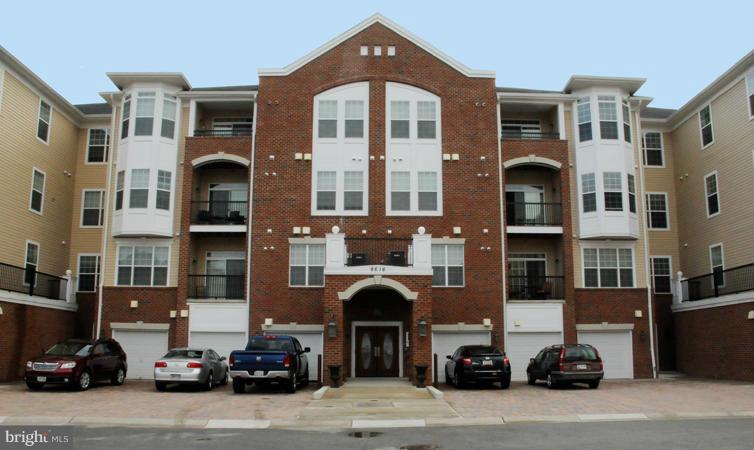 Beautiful 4th floor Elevator condo with all the bells and whistles! This unit has the extra Den with custom french doors, Up-Graded kitchen with top of the line SS appliances and Granite Counter tops. Four Season Fireplace, Front Garage with 2 extra parking spaces. Easy to show. This property appraised in June for 305,000.
