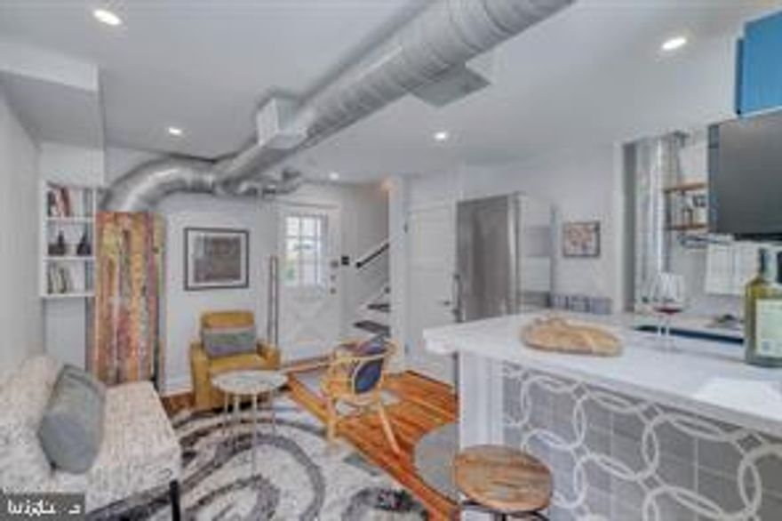 Stunning Renovated Home in Rittenhouse Square with Tax Abatement! Welcome to 1629 Rodman St, a fully renovated (2023) 2-bedroom, 1.5-bathroom home tucked away on a quiet, charming block in highly sought-after Rittenhouse Square. This thoughtfully updated residence offers a perfect blend of modern elegance and historic charm, with the added benefit of an approved tax abatement! Step inside to a bright, open-concept main level featuring high ceilings, recessed lighting, and original hardwood floors throughout. The modern kitchen boasts brand-new stainless steel appliances, sleek quartz countertops, and custom cabinetry. Just beyond, an expansive private patio provides the perfect space for entertaining dining or gardening. On the second level, you’ll find a spacious sunlit bedroom with tall windows and a luxurious full bathroom, complete with a glass-enclosed rainfall shower. The third level is dedicated to a large loft-style bedroom with a convenient half bath, making it ideal for a primary suite, home office, or media room. Additional highlights include a clean, dry basement with laundry and mechanicals, offering ample storage space. Located in the heart of Rittenhouse Square, this home boasts a WalkScore of 99, placing you just steps from top-rated restaurants, and boutique shopping. With easy access to Center City, the University of Pennsylvania, and I-76, commuting is a breeze this house has the perfect location.