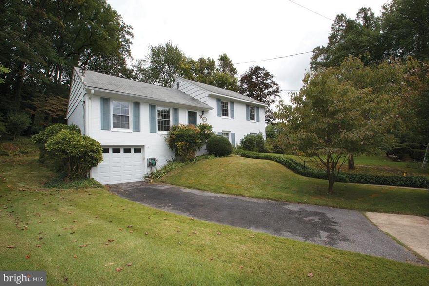Open Sun 11/8 11:30a-2:30p. Price Improved! SPACIOUS split lvl that features a beautifully landscaped yard; 2100+ sqft of living space; bright & open eat-in kitchen equipped w/ updated stainless steel appliances, sky lights & bay window; finished basement; garage; lovely patio & private garden that leads to a HUGE backyard. Located 1/4 mile from Connecticut Ave, 495 & walking distance of Metrobus.