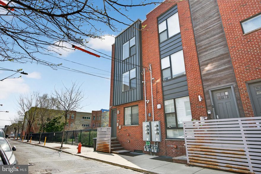 Welcome to 1918 E Letterly, Unit 2, a stunning two-story condo located in the heart of East Kensington. This rapidly evolving Philadelphia community offers excellent access to Fishtown and the vibrant Frankford Ave corridor. A true city jem, this unit includes a deeded, off-street parking stall in a private lot. Inside, discover a spacious layout featuring three bedrooms, each accompanied by its own full bathroom.

Hardwood floors guide you through the main floor, which hosts the kitchen, primary living space, a dedicated dining nook, and the first spacious bedroom. Your culinary space is equipped with all stainless steel appliances, a timeless white subway backsplash, and a quartz kitchen island with excellent storage and bar seating. Ascend to the second floor to find the other two bedrooms and full ensuite baths, with one including a walk-in tile shower. Laundry is also on this floor for added convenience.

Imagine spending your summer on your own private, sunny roof deck, complete with stunning panoramic city views! This condo at 1918 E Letterly #2 is located in the vibrant East Kensington neighborhood, putting you just blocks away from SEPTA access, diverse dining, cozy cafes, and so much more. Make this amazing spot your new home!