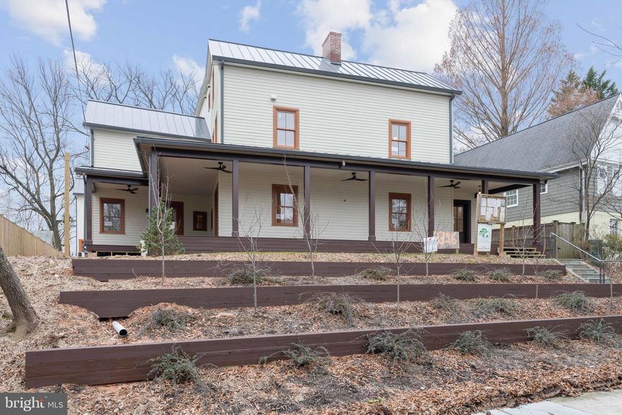 Finally, the latest luxury design trend for multi-generational residential building makes its way to DC: This residence is designed to generously accommodate three generations under the same roof, with over 8000 square feet of finished living space, an ADA compliant elevator to all four floors, roll-in showers (2) and other accommodation features.  Numerous add on buyer-specific customizable options are available for this home, including a ½ lap pool, pergola, and outdoor kitchen. This reimagined historic farmhouse, built with all the care and dignity of the original is meticulously crafted at high standards, with exterior finish details that include hand-milled custom wood siding by Colonial Hardwoods, standing-seam metal roofs, and custom wood windows from LePage, Canada. Interior finishes include custom American Cherry solid hardwood floors by Colonial Hardwoods to match the Pennsylvania Amish-crafted cabinetry by Misty Mountain, custom built-ins, stunning Moooi and Hubbardton Forge fine lighting and high-end Miele appliances. 

Main floor: The living area and kitchen are adjacent to the original* entry parlor (west side) and dining room (east side). An original fireplace (with optional gas insert) separates the parlor and dining room. An ADA compliant main floor suite is privately situated on the east side. 
Second floor:  The light-filled south facing mezzanine with double-vaulted windows is open to below, overlooking the main floor and back yard. Off the mezzanine is the primary bedroom suite with its southern balcony, sumptuous bathroom, and enormous dressing room. Two more bedrooms and bathrooms are located off of a private hall on the north side.  A laundry room is conveniently located on this floor.
Third floor: An open playroom with a full-length covered balcony is the central feature of this floor, adjacent to a large private study.  Two more spacious bedrooms and a shared bath are located off of a private hall on this floor.
Basement: A spacious gym or recreation area is the central feature complete with a ½ bath. A separate bedroom with ensuite bath has full legal egress, making it a great option for a nanny suite or guest room. 
Carriage House: A two-car garage with alley access is outfitted for EVs with a dual car charger. There is a studio with full bath and optional kitchenette atop the garage. 
The property backs to Lafayette-Pointer Park, and when the leaves are down it has a view of the National Cathedral. 

*In 1892 the newly married Horace Jones proudly added a state-of-the-art addition to the north side of his Chevy Chase farmhouse which was a much older structure likely dating from the previous century. The original farmstead at what is now 3326 Quesada St NW is believed to have been built by the Belt or Bradley families who successively owned the land and it was quite similar to the Bradley farmhouse incorporated into the Chevy Chase Country Club (in CC, MD). Horace's 1982 addition, updated to current building code, once again exhibits its wrap-around porch (torn off in 1924) and preserves its original layout of entry parlor and dining room on the main level, with two bedrooms on the second floor and attic space (now finished) on the third floor. It is Horace's original gift to his bride with updated to-code construction and two bathrooms added to the original layout. The original 18th C. farmstead was razed in 1924, leaving only the 1892 addition standing.

Pictures are actual progress reports and some idea renderings. This home is substantially complete, at the punch list stage.  Significant price drop! Open Sundays 2-4pm and by appointment.