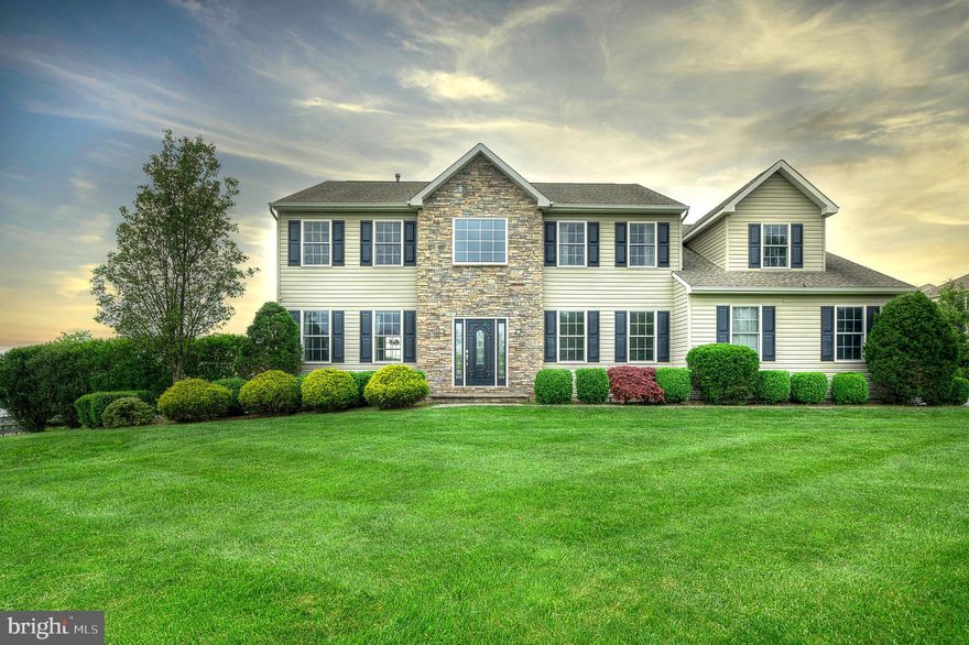 Showings will begin at the twilight open house on Friday May 10th from 5-7 PM. The best of all worlds, this fabulous custom-built home on 2.24 acres was built in the established neighborhood of North Pointe, Solebury Township in 2013.  NO Association fees and NO association rules to follow! This is not a tract home: Built with 2x6 Construction and engineered lumber,  9 foot first floor ceilings, Andersen windows and doors, and an extra deep "Superior" engineered foundation with built in egress, public water and sewer, dual zone energy efficient gas heat and air conditioning. The open concept floorplan features a large gourmet kitchen with huge kitchen island, granite tops, stainless steel appliances, tile backsplash. Hardwood floors throughout first floor and upstairs hallway. Large private office on main floor. Gas fireplace in family room. Huge owners suite with sitting room, two walk in closets and bonus room which the current owners have outfitted as a custom dressing room/closet with storage island. The sumptuous main bath with large soaking tub, custom tile shower and tile floors was renovated in 2021. Three additional bedrooms are serviced by a tile main bath with dual sinks.  Long driveway to side entry garage. Electric vehicle charger inside garage. HUGE custom covered rear patio overlooking your park like back yard with long-distance views. Fully finished basement. Large storage shed. Easy commute to 202. Walk to New Hope to enjoy shopping, dining and entertainment. New Hope-Solebury Schools! This home will not last!