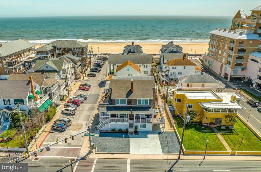 Here is your opportunity to own one of only a few properties in Ocean City that can accommodate 40 guests under one roof!! This property is a multi-family building that has been completed renovated in downtown Ocean City. Set up as a duplex with 6 bedrooms, 3 bathrooms, 2 kitchens, and 2 laundry rooms on each side! Each side comfortably sleeps 20 guests. Combined, this property has 12 bedrooms, 6 bathrooms, 4 kitchens and 4 baths; sleeping 40 total! Maintenance free exterior with cedar siding and composite decking/vinyl rails. Currently the property is used as a duplex, but has the option for a lockout basement, making 4 total units if desired. Brand new HVAC throughout in 2022. This property consistently brings in > $300,000 in rental income each year! There are still a lot of holes to fill in the calendar and we are currently at $318,226 on the books for this season. This house prints money!! If interested in using this property as a rental, the current property management company charges 12% of the nightly rate if the new owner has interest in continued rental success and a seamless transition. 2024 Rentals must be honored.