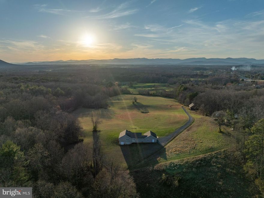 Incredible opportunities exist on Fox Mountain Farm with 82.67 acres of phenomenal Blue Ridge Mountain views!  The property includes a lovely and well-maintained 3 bedroom/2.5 bathroom/2 car garage home with easy main level living. The home could serve as your primary home, your weekend getaway home, or a place to reside while you build your dream home.  The full unfinished basement is awaiting your customization -  create a workshop, home office, additional bedrooms, etc. With the property currently being in land use status, a farm may be in your future! The property provides a beautiful mix of open fields and wooded areas which lends to the allure of this secluded sanctuary. The picturesque small town of Culpeper is just a short 10 minute drive away via route 29. Come on out and visit!