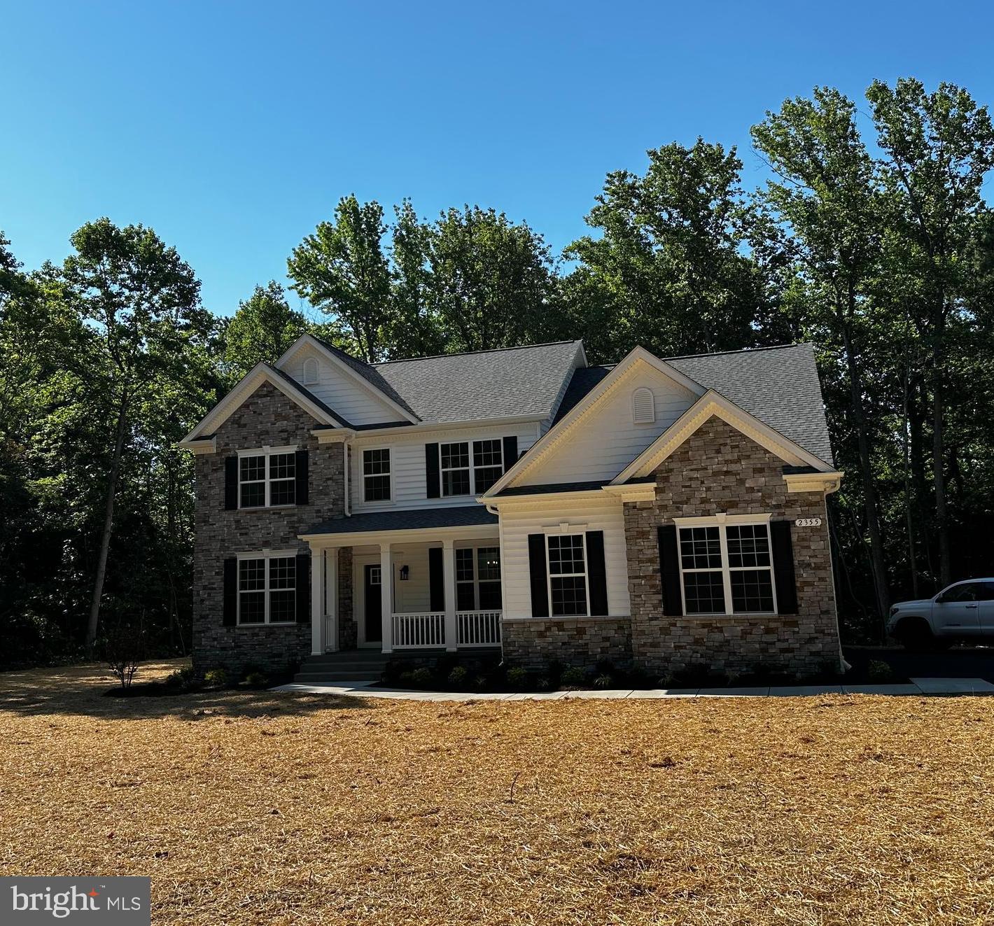 This gorgeous stone front QBHI, Fairfax sits on approximately 1.5 acres in beautiful Park Chesapeake with seasonal water views from it's screened in back porch. This home offers a 2.5 sideload garage with mudroom, upgraded kitchen with double wall ovens, gas cooktop, built in microwave, HUGE Island, large kitchen table space area (2' extension here) leading to the screened in back porch. The family room is off of the kitchen with a gas fireplace, separate living and dining rooms, plus a study next to the full bath... The Upper level offers 4 bedrooms, which includes a large owners suite with an angled tray ceiling, sitting room, 2 walk in closets and owners bath with a deluxe shower, double vanities, and soak in tub. Bedroom 3 has a walk in closet, plus the 2' side extension in this home increases the size of both bedrooms 3 and 4. The Laundry room is also located on this upper level! The basement is unfinished for storage and future plans OR add it in with QBH and it can be completed before settlement. QBH does offer $15,000 closing help with the preferred lender and title companies OR they will pay for a 2-1 buy down (interest rate) plus an additional $5,000 closing help, also with the preferred lender and title company. Call for your private showing.