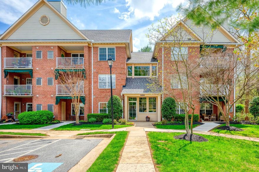 NEW PRICE - BEST BUY IN MAYS CHAPEL NORTH!  Picture perfect ground floor unit offers the convenience of entering directly from your cozy patio, or through the front door building entrance!  Great layout with spacious kitchen, breakfast/dining room that leads to the patio w/new concrete sidewalk (2024), awning, & extra storage; large living room with gas fireplace & crown molding.  The primary bedroom boasts a walk-in closet & full bath with double sink.  Second bedroom is also spacious with another walk-in closet.  Plenty of space in the utility/laundry room.   Freshly painted less than two years ago, carpet two years old, 2022 water heater, Pipco AC/furnace late in 2023; dishwasher, all new Window Nation windows, stove w/built-in air fryer, microwave, extra large fridge, plantation shutters - all late 2023 - nearly $30,000 worth of improvements!  Conveniently located near Roundwood Center with Graul's gourmet grocery, dining, convenience stores, etc.