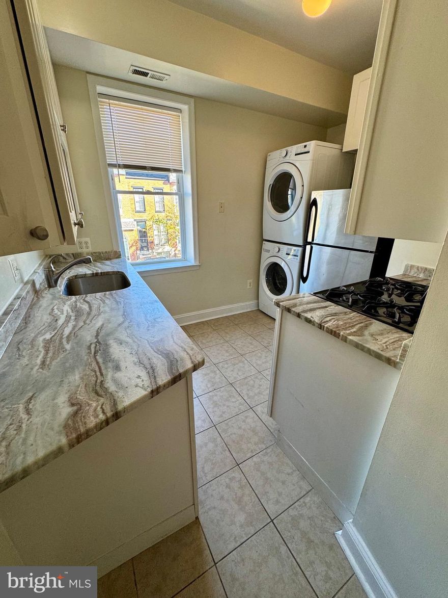 Don't miss out on seeing this charming two bedroom / one bathroom unit in the heart of Riverside Park, one of the most desirable areas of Federal Hill! Amazing unit close to everything... truly a GEM! The kitchen boasts stainless steel appliances, gas range and granite countertops. Perfectly situated near Leone Riverside Park and walking distance to shopping, groceries, iconic bars and restaurants in Baltimore. Do not miss the opportunity to see this unit!  Front door entrance is on Convington St.