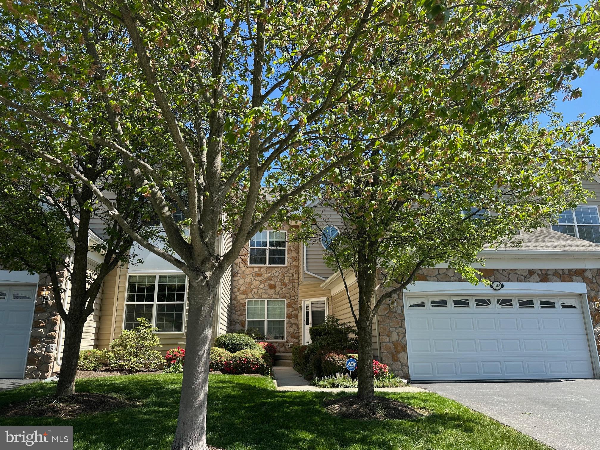 Welcome to a rare opportunity in the Rivercrest Community! From the moment you enter this exclusive Toll Brothers gated enclave, you'll be captivated by its charm. This meticulously cared-for Carriage Home is the one you've been searching for! Step inside to a bright foyer that seamlessly leads to an open dining and living area. The dining room is highlighted by a stunning tray ceiling and chair rail, while the living room's expansive floor to ceiling windows flood the space with natural light. The eat-in kitchen is a chef's dream, featuring elegant cabinetry, granite countertops, a double oven, and a gas cooktop. Adjacent is a cozy family room with a gas fireplace, ideal for entertaining. The first floor also includes a spacious laundry room and a convenient powder room.
Upstairs, the primary bedroom offers a large walk-in closet and a newly remodeled en suite bathroom, providing a spa-like retreat. The walk-in closet was just upgraded with custom California Closet-style shelving. Two additional bedrooms and a full bathroom complete the second floor.
The finished basement presents a vast open area, a fantastic office space, and ample storage. Outside, a generously sized deck awaits, perfect for morning coffee or evening relaxation. The home also includes a two-car garage and is just minutes from Providence Town Center in the sought-after Spring-Ford School District. With an award-winning golf course, country club, pool, and gym nearby, this home and community truly offers the perfect lifestyle!
