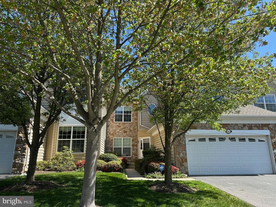 Welcome to a rare opportunity in the Rivercrest Community! From the moment you enter this exclusive Toll Brothers gated enclave, you'll be captivated by its charm. This meticulously cared-for Carriage Home is the one you've been searching for! Step inside to a bright foyer that seamlessly leads to an open dining and living area. The dining room is highlighted by a stunning tray ceiling and chair rail, while the living room's expansive floor to ceiling windows flood the space with natural light. The eat-in kitchen is a chef's dream, featuring elegant cabinetry, granite countertops, a double oven, and a gas cooktop. Adjacent is a cozy family room with a gas fireplace, ideal for entertaining. The first floor also includes a spacious laundry room and a convenient powder room.

Upstairs, the primary bedroom offers a large walk-in closet and a newly remodeled en suite bathroom, providing a spa-like retreat. The walk-in closet was just upgraded with custom California Closet-style shelving. Two additional bedrooms and a full bathroom complete the second floor.

The finished basement presents a vast open area, a fantastic office space, and ample storage. Outside, a generously sized deck awaits, perfect for morning coffee or evening relaxation. The home also includes a two-car garage and is just minutes from Providence Town Center in the sought-after Spring-Ford School District. With an award-winning golf course, country club, pool, and gym nearby, this home and community truly offers the perfect lifestyle!