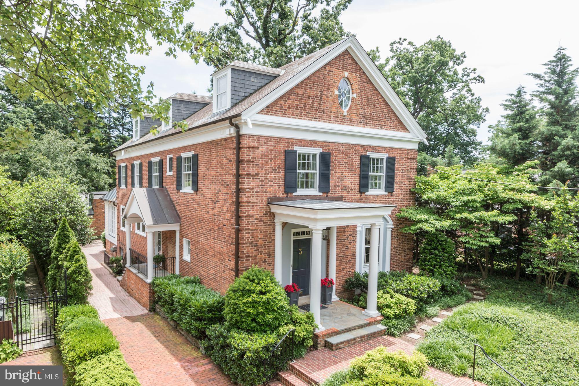 $250,000 price reduction. Large,elegant, living and entertaining space in this Georgian style home. Move in condition in the heart of Massachusetts Avenue Heights off of Woodland Drive. Five large bedrooms and four full baths on two upper floors. Owners suite with spa-like bath and walk-in closets. Fantastic Great room addition plus garage and driveway parking.
