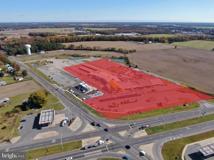 A prime investment and/or redevelopment opportunity fronting Sussex Highway (RT 13) and County Seat Highway (RT 9) in Laurel, Delaware. The 8-acre site currently features a 69,000 SF multi-unit commercial building and gas station (6-yrs left on gas station lease; property owner receives a rebate based on gallons sold). There is a permanent easement in place with the adjacent Burger King and cell tower. Stormwater management in place with prorated maintenance agreement based on amount of land owned. Any upgrades to stormwater management are billed to whoever requires.  Water and sewer stubbed and available. No restrictions. This site lends itself to a variety of possible uses and is situated at a highly trafficked, signaled intersection! Site plans, easement agreements, EDU information & more available upon request.