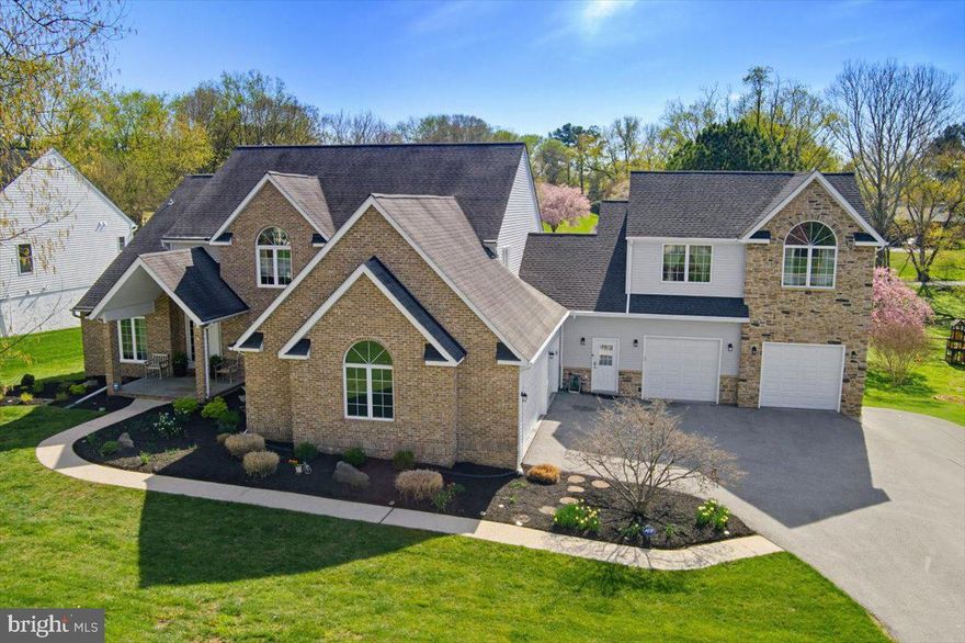Exceptional custom residence offering over 6,000 finished sq ft, a rare 5-car garage, and a private upper-level 2BR suite ideal for guests, extended family, an au pair, or flexible lifestyle needs. Situated in highly desirable Patapsco Park Estates, this home combines space, flexibility, and convenience in a way rarely available in Ellicott City.

Inside, you’ll find hardwood flooring on two levels, generously sized living areas, an updated gourmet kitchen, dramatic fireplace features, finished walkout basement, wet bar, theater/media space, and a layout designed for both everyday living and entertaining. Outdoor living is equally impressive with an expansive 663 sq ft TimberTech composite deck with integrated lighting and multiple entertaining areas.

Car enthusiasts, collectors, hobbyists, or buyers needing exceptional garage and storage capacity will immediately appreciate the rare 5-car garage setup and expansive driveway parking—features rarely found this close to major commuter routes, shopping, dining, and top-rated schools. This property offers estate-style space and functionality without the long commute often associated with larger luxury homes.

Rare opportunity for buyers seeking space, flexibility, garage capacity, and long-term value in one of Howard County’s most sought-after communities.