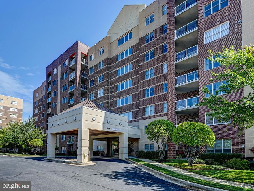 Come see this immaculate 2 BR 2 BA 4th Floor condo with secure access to Lobby, dual elevators & beautiful lobby! The  granite & stainless Kitchen offers a a large island w/breakfast bar,  gas cooking, 42" cabinets, ceramic tile floor and is open to the Family Room/Breakfast Room w/fireplace and access to the balcony.  Gleaming hardwood floors  grace the  Foyer, Living Room, Dining Room and both Bedrooms.  The spacious & bright Living Room  has a  large window,, built-in shelving and is a great place for entertainment! The Primary Bedroom has a walk in closet & private bath with shower.  In addition, there is a  2nd Bedroom and Full Bath as well as a Laundry Room/Utility Room.  The  secure storage room w/private  storage area is located on this level and convenient to this unit and the private balcony overlooks the beautiful greenspace  w/Gazebo. HWH & HVAC replaced 2025.   Enjoy access to Graul's, shops, restaurants and a walkable neighborhood with open spaces and nearby pools.  You won't want to miss this one!