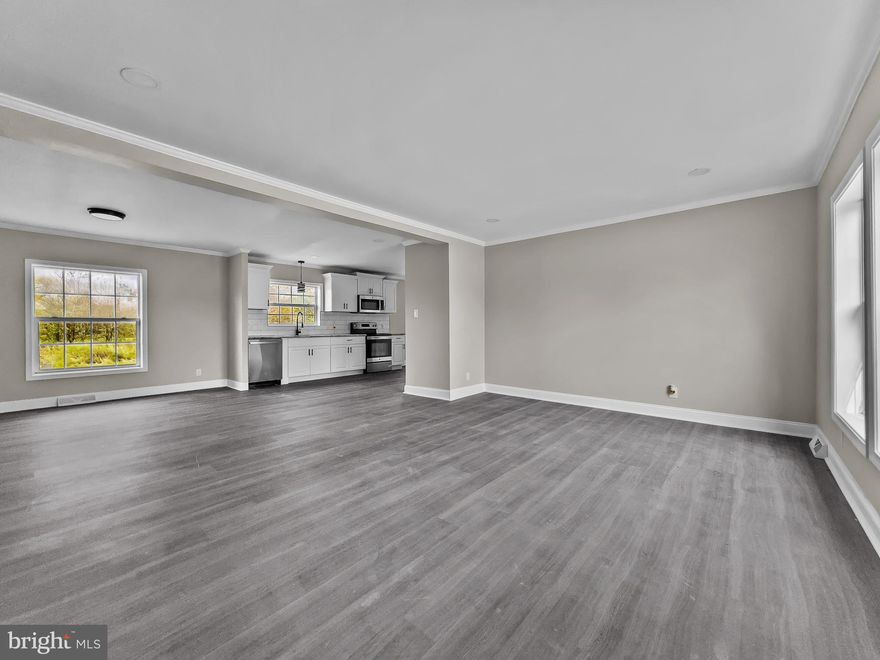 Come check out this renovated rancher in Hurlock! The spacious living room features large windows and new LVP flooring flowing perfectly into the kitchen. The kitchen has been remodeled with custom tile and granite countertops, and new appliances. The bedrooms are generously sized with new carpeting, while the bathrooms have been upgraded with new fixtures. This property comes with a new HVAC system as well! You do not want to miss this one, schedule your tour today!