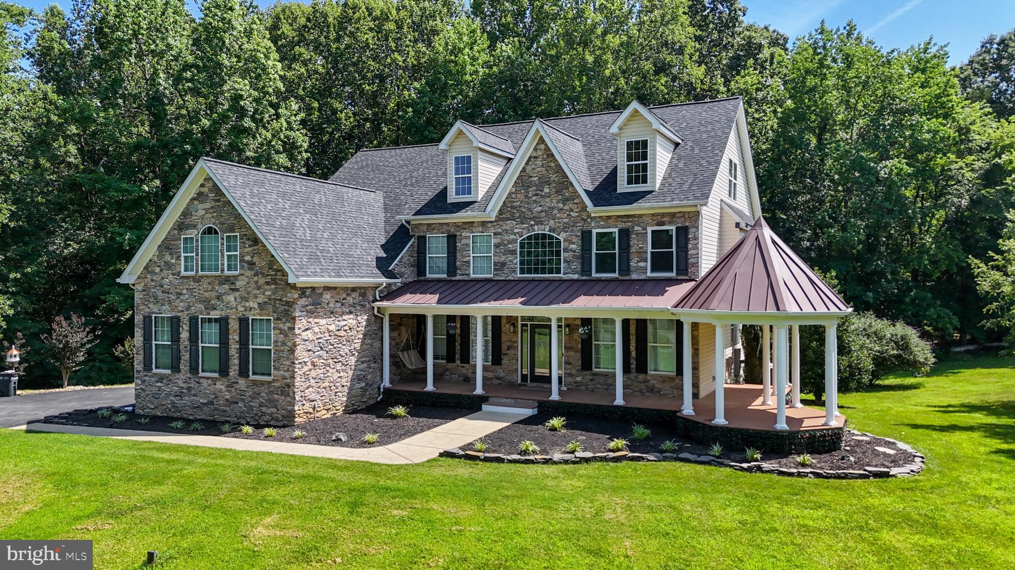 🌳 **Sprawling Estate on 5 Acres in La Plata, MD** 🌳
Welcome to **8070 Amberleigh Place**, an exceptional opportunity to own a **private oasis** in one of Southern Maryland’s most peaceful and sought-after communities. This **spacious home spans over 5,000 sq ft** and is beautifully situated on **5 acres of lush, serene land**, offering the perfect blend of luxury, comfort, and privacy.
Step inside to discover an **open-concept floor plan** designed for both everyday living and effortless entertaining. The heart of the home is a **gourmet kitchen** that opens to a bright living and dining area, all leading to a **screened-in porch**—ideal for enjoying quiet evenings overlooking nature.
The **expansive owner’s suite** is a true retreat, complete with a **spa-inspired bathroom**, a **massive walk-in closet**, and **loft space above** with its own **private bathroom**—perfect for a home office, gym, or guest suite. The **fully finished basement** adds even more living space, perfect for a home theater, game room, or multi-gen living.
Additional highlights include:
✅ 6 Bedrooms
✅ 5+ Full Bathrooms
✅ Vaulted ceilings
✅ Custom upgrades throughout
✅ Ample parking and storage
✅ Tranquil setting with room for a pool, garden, or workshop
📍Just minutes to local shopping, dining, and commuter routes while still feeling like your own private getaway.