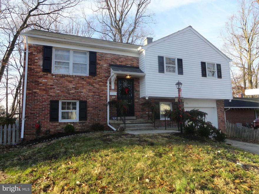 This light & airy home has lots of upgrades: new roof(8/18), attic insulation(8/18), gas hot water heater(8/18), new deck in rear(12/18), new stove & dishwasher(8/18), landscaped(12/18),  home & garage freshly painted(8/18), new carpet & vinyl wood flooring(8/18), attic pull down stairs, cute front porch, 1 car gar.,  rear motion detector lts., rm. in lower level could be an office or 4th bdrm., atrium off of liv. rm. has 6 skylts., lower level has 2 sliders leading into atrium w/slider leading to bk. yd. which  faces woods, new deck in rear, fully fenced in yd., separate laundry rm.  w/laundry tub & washer & dryer.  OPEN HOUSE 1/12/19, SAT. 1:00-3:00 P.M.  COME SEE!