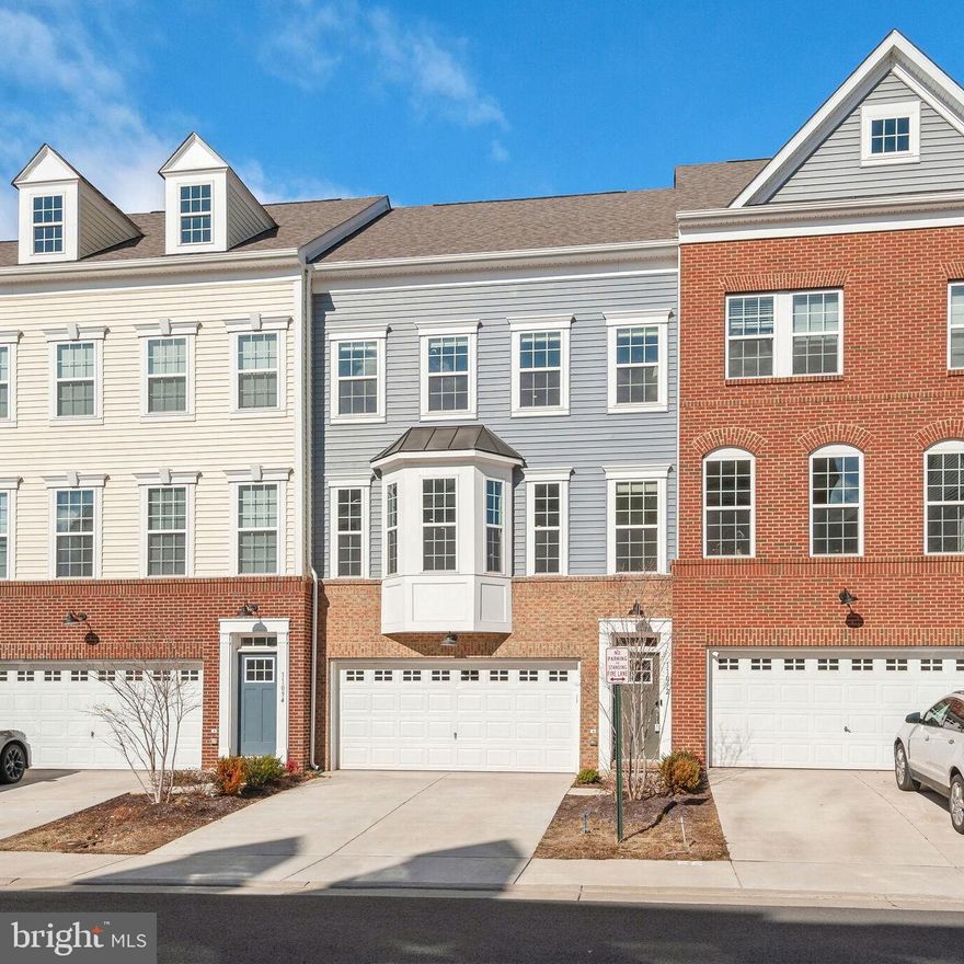 Experience the charm of Blackburn with this like new, stunning 3BR/3.5BA townhome, located just minutes from I-66. Boasting 2,629sqft of living space, this colonial-style home boasts 9’ft high ceilings and an additional 4ft extension, complete with modern LVP flooring and a neutral color scheme. Step inside to discover an open floor plan, featuring a large living room with sliding glass doors that lead to the deck, perfect for entertaining on the low maintenance Trex deck and brand new patio, providing a perfect open and unobstructed view. The gourmet kitchen is a chef's dream, with stainless-steel appliances, granite countertops, a gas range, built-in microwave, and a center island with breakfast bar seating. The fully finished basement offers a huge family room/flex space, a full bathroom, and a closet, providing plenty of room for guests. The oversized primary bedroom offers plush carpet, Venetian blinds, ample closet space, and an attached en suite with a dual sink vanity, shower and oversized tub. The two additional bedrooms are spacious, stylish and featuring Venetian blinds. Other features include an attached 2-car garage and driveway, laundry area, and a convenient location just 18 miles from Dulles International Airport and 31 miles from Washington D.C. Enjoy nearby amenities such as the Promenade at Manassas, restaurants, medical facilities, Costco, Manassas National Battlefield Park, Northern Virginia Community College, VRE Manassas Station and more! Love this home for its warmth, functionality, and prime location. It's sure to make a wonderful home for its next owners.