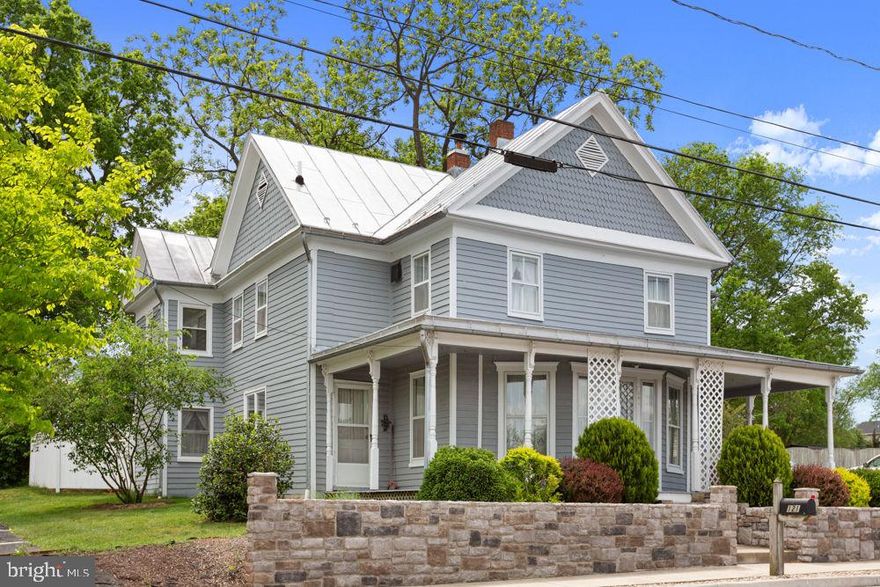 This charming 1900’s Victorian home offers lots of detailed woodwork, beautiful hardwood floors, cedar closet, formal dining room with crown trim and old fireplace “sold as is”. The formal living room offers built-ins, crown trim, bay window and a small nook for reading, bird watching, etc! The well-appointed kitchen offers Pickled Oak Cabinets with ample counter space to prepare family meals with breakfast island and space for table/chairs. Off the kitchen is an office area with access to laundry/half bath and to the rear terrace overlooking a large back yard with mature trees and workshop. The upper level features the owner’s suite with sitting area/office space and full bath. Above the owner’s suite is a loft area for storage, playroom, etc. There are 2 additional bedrooms, office/4th bedroom, full bath on the upper level with access to the upper deck from the enclosed porch. New wrap around porch! Easy access to Main Street in Broadway to enjoy small shops, dining, Heritage Park that borders the Linville Creek and host various festivals, farmers market, garden nursery, future Rail Trail. Near the North Fork of the Shenandoah River and within 5 miles of Walmart, Food Lion, hardware/auto parts stores and I-81.