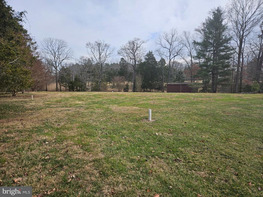 2+/- acre lot on Peachblossom Creek. Access is Peach Blossom Rd. The lot is adjacent to the existing house. A waterfront shed used for boat storage is included. The lot has a current survey by Rauch Engineering outlining the well and septic areas.