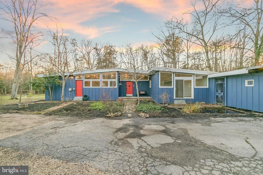 ONE OF A KIND MID CENTURY MODERN IN SOUGHT AFTER MOYAONE RESERVE!! Designed by Lyle Rowley, a noted Dallas architect and underwent a full renovation within the last 10 years, accenting it's charm and maintaining the character of this mid century.. Vaulted ceilings and large picture windows give the home an open feel while incorporating the beauty of the natural surroundings.. Recent bathroom remodel with glass shower enclosure and double vanity with leathered granite top.. Less then 2 miles from Moyaone community center and pool, close to the Potomac kayak launch.. The grounds include fruit trees, wood shed, woodland trails, fire pit, small ponds and meadow making this a unique, calming, oasis to call home.. Recent deep well & septic.. High speed internet access available from comcast or verizon.. Don't miss this opportunity to own your own 5+ acre retreat, conveniently located near route 210 and just a short drive to Northern Virginia, National Harbor, and Washington DC