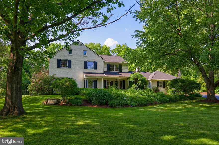 Absolutely stunning colonial-style home with over 4,000 square feet set on a sprawling 1.55 acre property nestled in the private Brook Farms neighborhood, backing to Lancaster Country Club and adjacent to the Conestoga River. Brimming with an abundance of natural lighting from the many windows, this impeccably cared for house is filled with lots of fine details and charm. Beautifully updated kitchen with cathedral ceilings features 3 skylights, large island, granite countertops with tile backsplash, recessed lighting, stainless steel appliances, and accesses the stone-paved patio.  Enjoy large gatherings in the formal dining that opens off of the kitchen and includes elegant chandelier, French Doors leading to the brick front porch, and crown molding. Main floor additionally offers living room, family room, and den all with fireplaces, built-ins, and hardwood flooring, a game/garden room with tile flooring and tray ceiling, a full bathroom and a powder room, as well as renovated large laundry/mudroom with lots of storage. The second floor consists of 4 sizable bedrooms and 3 full baths. The spacious primary suite includes a large walk-in closet, artistic built-ins, arch top window with views of pond and pool, and connects to a recently renovated bath with soaking tub, open shower, and new countertops. Delight in your private outdoor oasis with the extensive lush landscaping, mature trees, in-ground pool, and pond. There are various options for outdoor recreation and entertaining from the multiple patios and expansive yard.
