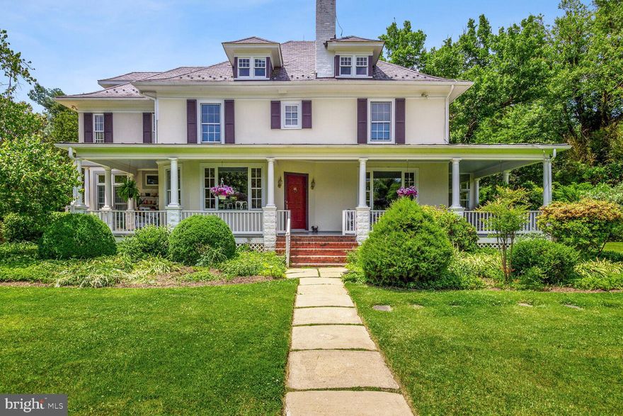 If you are looking for a special home on a 2-acre lot in Potomac, this is it. It is not one of those "cookie-cutter" homes. This is a beautiful, one-of-a­ kind home on a quiet and very private property near River Road.
As you turn into the hidden entrance onto the circular drive, you will enjoy the expansive front lawn with many beautiful trees and plantings.
The wrap-around porch welcomes you to this wonderful home. Upon entering, you come to a lovely dining room and large living room with a wood-burning fireplace. There are wood floors throughout the house: some are Carolina yellow pine, some oak, and the family room and some of the kitchen counters are made of wood from antique apple cider barrels. 
The kitchen is updated with stainless steel appliances and granite counters. It has ample table space and large windows overlooking a lovely brick patio. Next to the kitchen is a large family room with a wood- burning fireplace and lots of windows allowing in tons of natural light. There is a full bathroom adjacent to the family room. A glass-enclosed porch provides a private entrance on the side of the house.
Upstairs, the primary bedroom features a small balcony and wood-burning fireplace, plus 2 walk-in closets. The primary bathroom is customized with beautiful tile, two sinks, tub, walk-in shower, and separate room with toilet and bidet. The other three bedrooms are large and are served by two full bathrooms. The spacious third floor is partially finished and can be used for work, play, or sleep.
The backyard is delightful with majestic mature trees. Surrounded by stockade fencing, it features an in-ground swimming pool, cabana, open barn, all protected by an 8’ deer fence. Owners are permitted to have horses on the property. The sellers pride themselves on being environmentally friendly; no chemicals have been used on the grounds.  There is no HOA.  
The property is bordered by a County conservation forest preserve adding increased privacy.