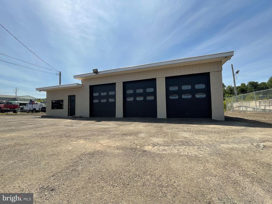 LOCATION, LOCATION, LOCATION!!! Highly visible and sought-after location for your line of LI/Commercial/Auto related work in Falls Township. Existing 3 Bay Garage building with office space and customer waiting area, includes all lifts and equipment as shown.  The building has been updated by current owner which includes..... office area has received all new flooring, paint, LED lighting. The bathroom has also been renovated w/new vanity, toilet, flooring, LED lighting and paint. The shop itself has had all new man doors installed, new LED high bay lighting, two new electrical panels, and has been painted completely. The roof has been recoated using white elastomeric forever coating w/ a lifetime material warranty, and 5-year labor warranty that is transferable to the new owner. Plenty of parking inside and out. The property currently does not have working water, as the existing well was found to be dry. Current owner has been approved for public water hook up and has paid all necessary fees to TOFA. Owner is currently waiting for the state road opening permit. It is buyers and buyer's agent responsibility to do due diligence with any and all permits, and future use and zoning of the property with the township directly. Sorry no leasing available and no "rent to own" being provided on this property. Agent is related to owner. Property is being Sold As Is with repair of water disclosed. Any other township/ lender requirements are responsibility of buyer. All measurements are estimated to the best of the seller's ability.