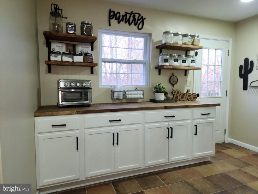 This spacious colonial home located in the sought-after Apple Greene subdivision sits on a generous 1.76 acre lot. This 3,855 square foot home has 4 bedrooms, 3.5 bathrooms and a finished basement. Nicely appointed great room has a gas fireplace and opens onto a screened in porch for summer entertaining. Wood floors, updated bathrooms, and a butlers pantry add to the charm of this home. Primary suite has 2 walk-in closets, a sitting area and a stylish bathroom. Fenced backyard, storage shed and oversized 2 car garage is an added bonus. Roof, septic tank and 1 HVAC unit were replaced Fall of 2021. This home could be yours today!