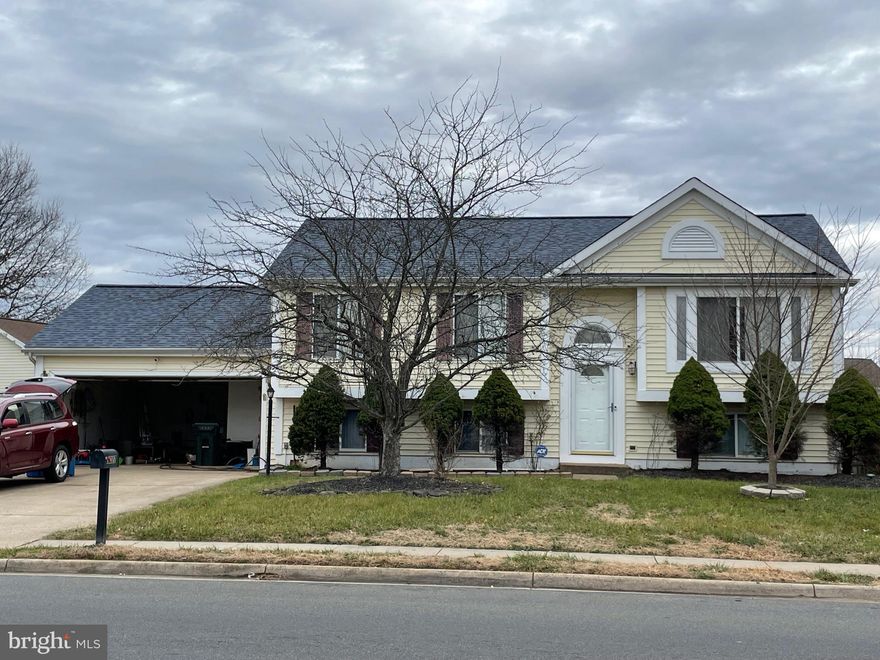 Location! Location! Location! Ready to move right in. 2 car garage. Upper level will surely not disappoint- Cherry hardwood floor. 3 bedrooms,  and 2 full bathrooms .  New roof (2020) and new appliances. The lower level features a  rec room with bar. New roof (2020) and new appliances.