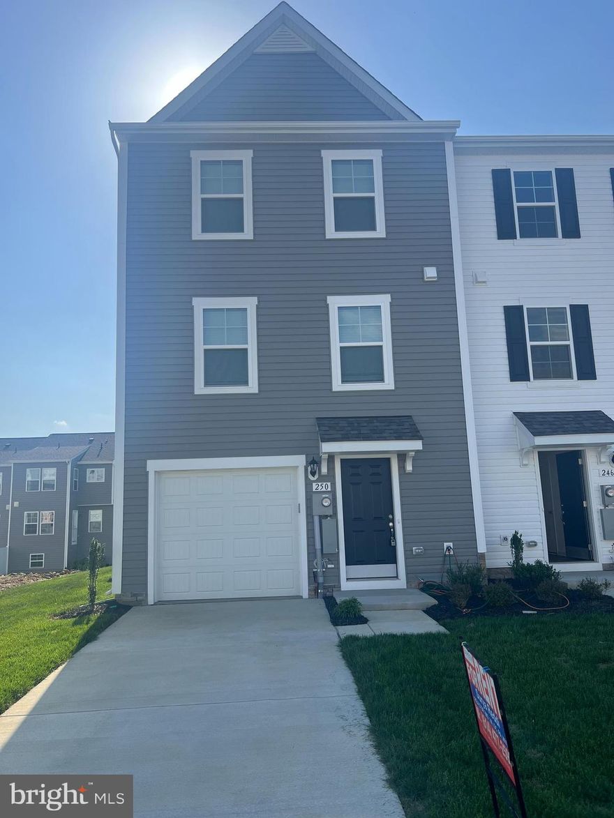 END UNIT - Homes Overlook at Riverside Stunning Brand-New Townhome
Discover modern living in this spacious 4-bedroom, 3.5-bath townhome! Upon entry, enjoy a finished recreation room perfect as a fourth bedroom complete with a full bath and a 6-foot extension for added space. The main level boasts elegant luxury vinyl plank flooring, an open living room with a convenient powder room, and an eat-in kitchen featuring a large island, quartz countertops, and stainless steel appliances.
The primary suite offers a generous walk-in closet and an en suite bath with a dual-sink vanity and oversized seated shower. Upstairs, two additional bedrooms, a full bath, linen closet, and centrally located laundry complete the upper level.
Located in a vibrant new community, residents enjoy fantastic amenities such as a dog park, children's play area, basketball court, tennis court, and recreation space all included! Conveniently situated for I-81, Rt 11, and I-70 commuters, this home offers beautiful mountain views and is within walking distance of shopping, dining, and Spring Mills schools. Just minutes from the MD line.