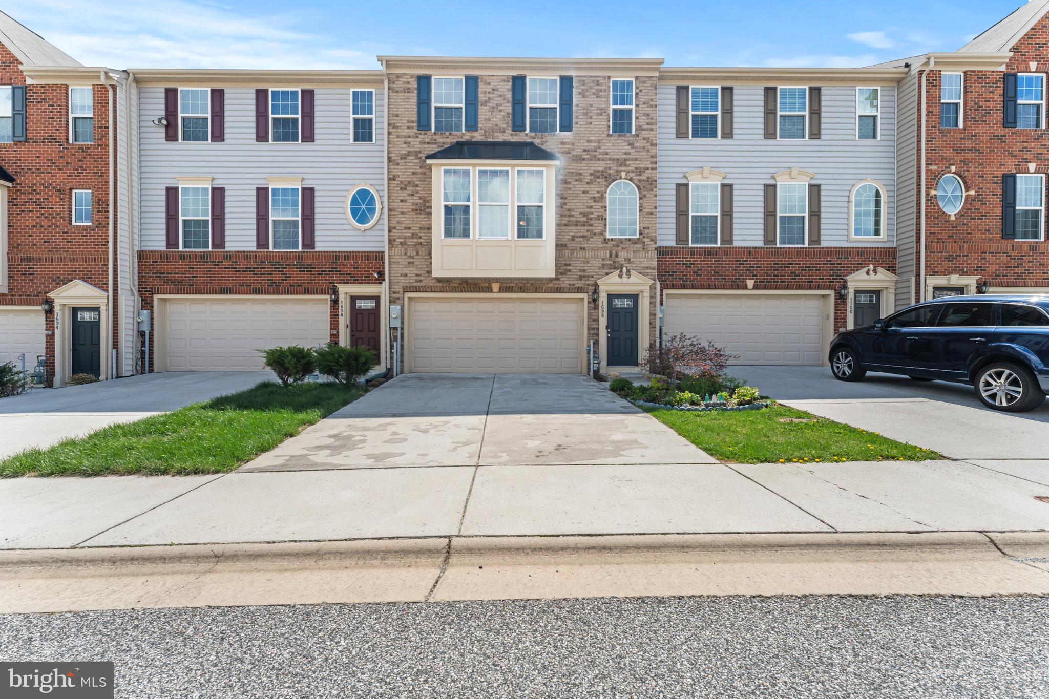 Welcome to this beautifully maintained 3-bedroom, 2.5-bath brick-front townhouse in the desirable Greenway Farms community of Havre de Grace. Offering three finished levels and a spacious two-car garage, this home is thoughtfully designed to suit every lifestyle.
The main level features elegant, rich hardwood flooring throughout. The gourmet kitchen is a culinary dream, complete with stainless steel appliances, granite countertops, a 10-foot center island ideal for meal prep and entertaining, 42-inch cabinetry, recessed and under-cabinet lighting, and stylish pendant lights. The adjacent dining area carries the hardwood aesthetic and includes a generous pantry for added storage.
Upstairs, the primary suite provides a relaxing retreat with an en-suite bath featuring a dual-sink vanity and a large ceramic-tiled shower with bench seating. Here you can also find your spacious walk in closet ! In the hall there are two additional bedrooms, a full bath, and convenient upper-level laundry complete this floor.
The entry-level offers a versatile flex space—perfect as a second living area, home office, or playroom—along with a half bath and direct garage access. Step outside to your private backyard oasis, highlighted by a beautifully maintained wood patio and gazebo, ideal for outdoor entertaining and relaxation.
Enjoy access to top-notch community amenities, including a vibrant clubhouse, fitness center, tennis courts, and a gated in-ground pool—offering a lifestyle of comfort and leisure in a scenic neighborhood setting.