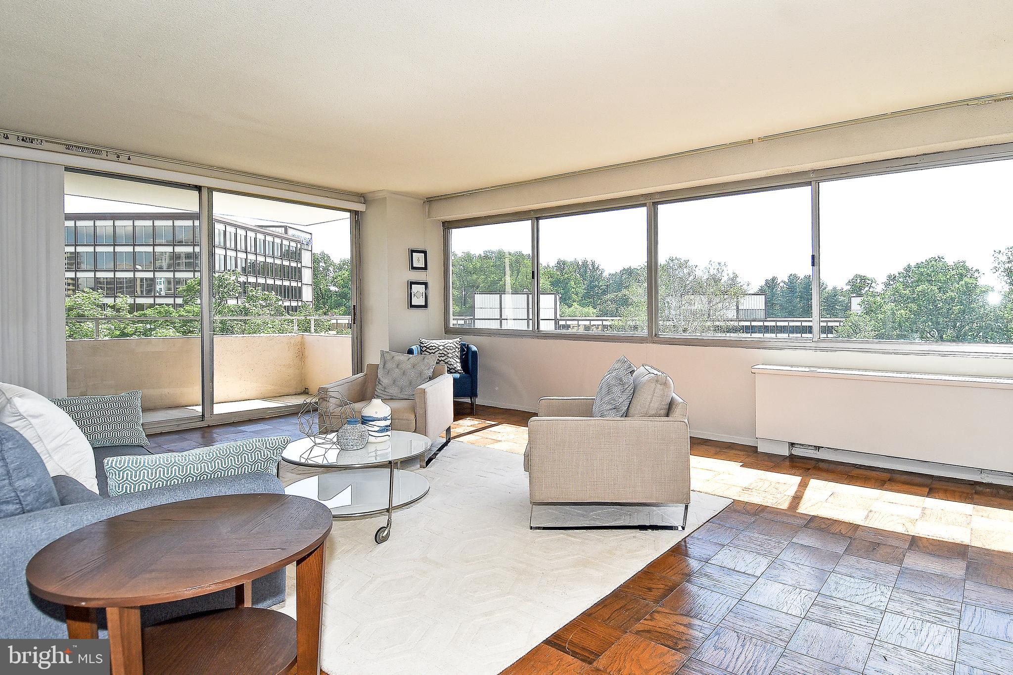 This beautiful and recently updated 3 bedroom, 2 bath unit featuring a private balcony, parking and wrap around views is now available for rent. This lovely unit features fresh paint throughout, large windows, ample storage and spacious rooms. Enjoy lounging in the bright living room or eating in the dining room - perfect for entertaining guests. The main bedroom offers an ensuite bathroom and large walk-in closet! The 2 additional bedrooms could also be used for guests, exercise or home offices - the options are endless. Located directly next to the practically private laundry room and near the South elevator that takes you to the roof deck, pool, exercise room and down to the lobby ministore. 24 hour concierge service, excellent building management and welcoming community make The Willoughby a gem in Friendship Heights. Catch the free shuttle to shopping and the Metro. Easy Living!