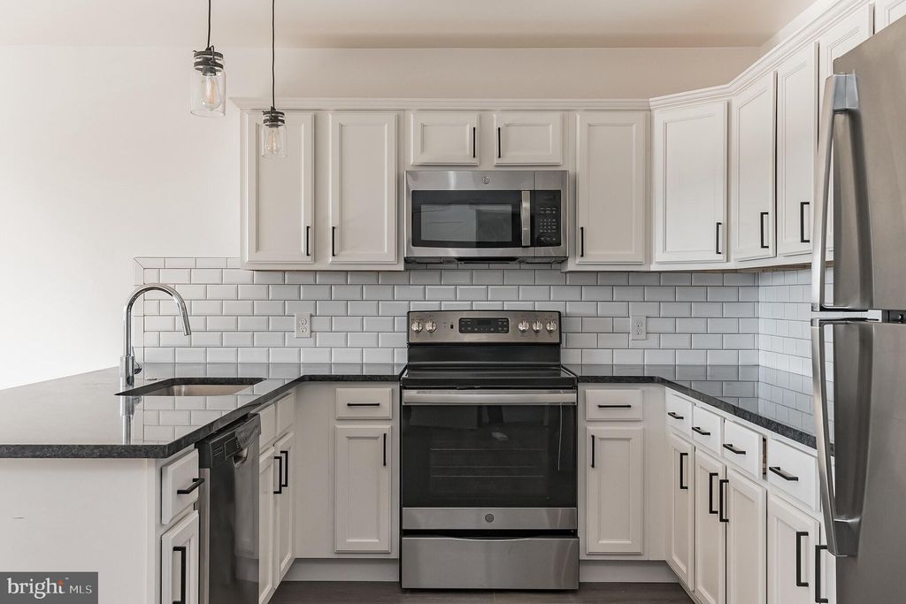 Photo of 6649 Ridge Avenue #A118, PHILADELPHIA, PA 19128 (MLS # PAPH2570932)