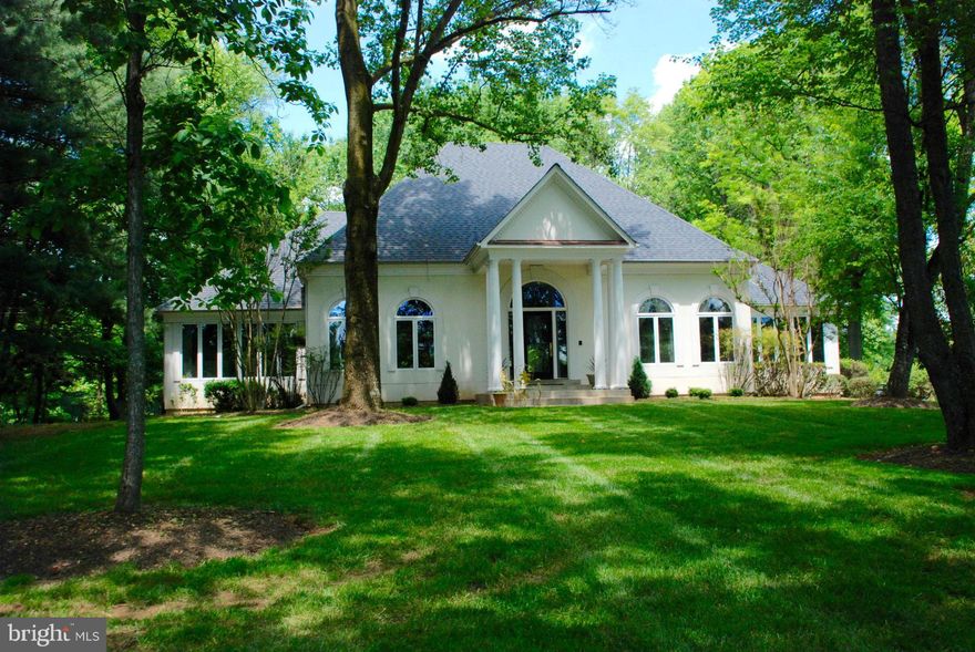 UNBELIEVABLE NEW PRICE!  STUNNING AND SOPHISTICATED custom contemporary home w/ view of golf course. Inviting Open Floor plan, engaging interior design,excellent condition built w/ highest quality materials.  Expansive gourmet kitchen w/ top brand stainless appliances, Miele, Wolf. Luxurious 1ST FL MASTER SUITE.Gorgeous outdoor space.Don't miss this opportunity for easy one level living!