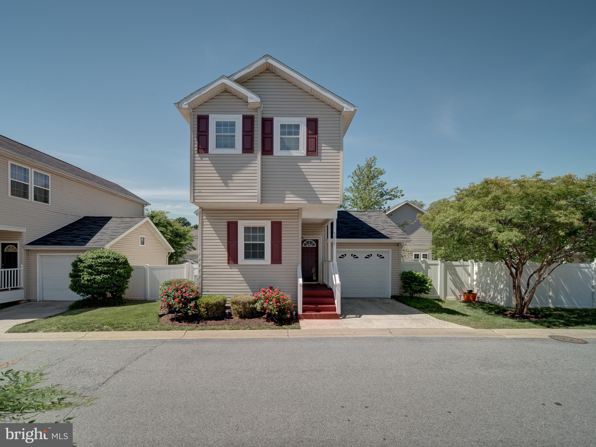 Move right into this beautiful three level home with 3 bedrooms, 2 full baths and 2 half baths, finished basement, beautiful open floor plan, deck, 1 car garage, huge, fenced yard. The community offers gated security, community pool, clubhouse, and much more! Thanks for showing!
