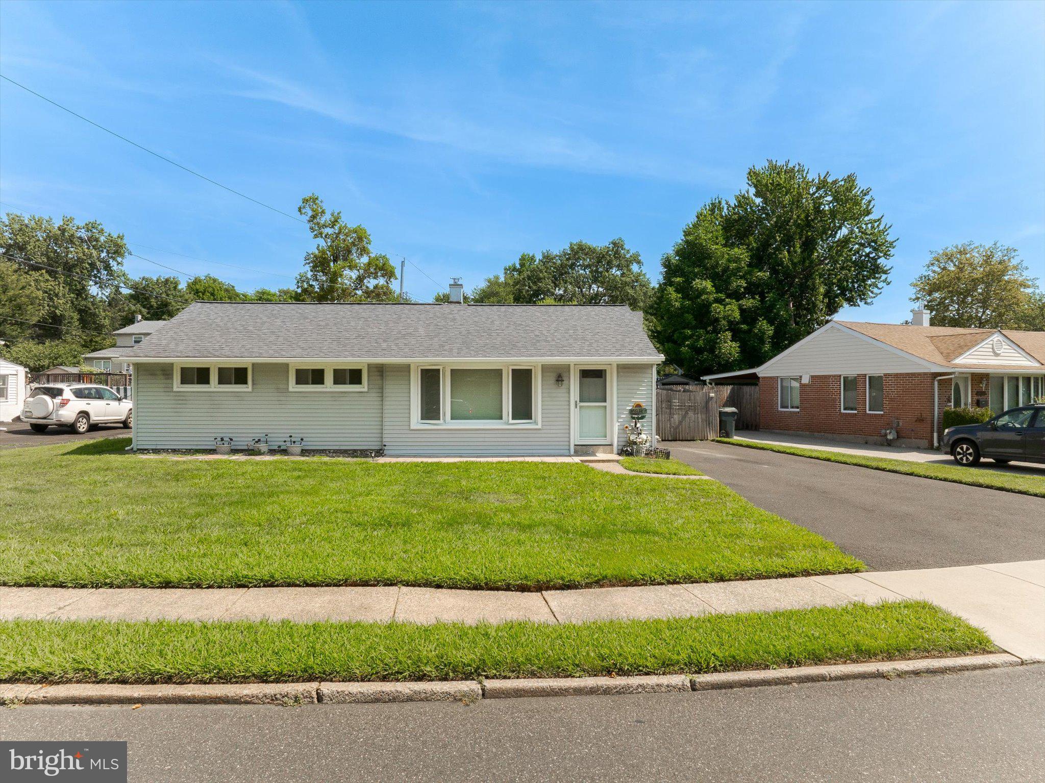 Everything's done, Here's the perfect house to buy and enjoy! It features a beautiful remodeled kitchen with designer white shaker cabinets, granite tops, stainless steel appliances, ceramic tile backsplash, recessed lights and laminate flooring. The bathroom also remodeled has an easy entry shower. The house is awash with natural light and beautiful laminate flooring throughout. Major improvements over the past 4 years include a new roof, new heater & central air, new water heater, new windows and siding. The rear yard is fenced and perfecto for entertaining with a full with custom patio. There is a rear he/she shed complete with an electrical panel and built in air conditioning. The location can't be beat within minutes of Abington Hospital, Whole Foods, Trader Joes, train to Philly and major highways. Don't wait, you could be in by Labor Day!