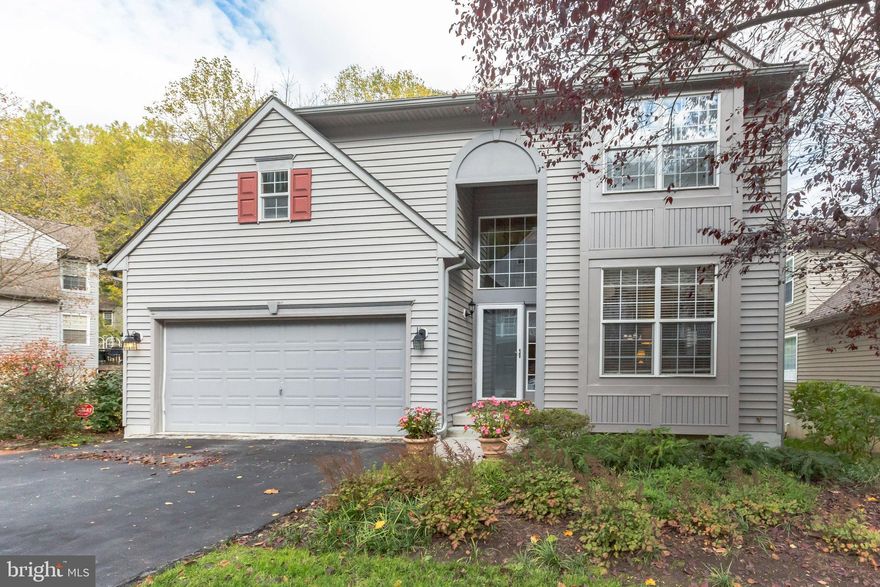 First Floor Master Bedroom a Real Plus!! Resort Living at its best! Pride of ownership shines through this stunning home, situated on a quiet cul-de-sac street in the sought after community of Somerset Lake. Upon entering the living room you will feel warm and welcome by the bright open floor plan. Open to the dining room, boasting gleaming hardwood floors, double crown molding and a stately column and 9ft ceilings throughout the home. Promoting a great space for entertaining guests or hosting holiday parties. The large chef’s delight kitchen is truly the heart of the home. Featuring corian countertops, a center island with seating and storage, 42” bright white cabinets, including a pantry cabinet, and a breakfast room with a built-in counter, wine rack and desk. The family room, open to the kitchen, is accented with a gas fireplace, vaulted ceiling and access to the deck area, creating a warm space to cozy up with a book or gather with the family for game night. Continuing on the main floor, is a den/office with built-in bookshelves, a powder room, laundry room and master bedroom with a walk-in closet, private bath with a stall shower, tile floor, double sinks and a soaking tub. The allure of this home continues to the upper level where you’ll find three additional generously sized bedrooms with double door closets, a linen closet and main bath. Venture to the lower level with 9ft ceilings, to find a show stopping theatre room equipped with a curtain opening to the projection screen, theatre seating, recessed lighting, a kitchenette with plenty of cabinetry, a dishwasher and mini refrigerator. Completing the lower level is a utility room, storage room, full bath with a stall shower. Double doors lead into a bonus room with built-in arch shelving units, with access to a covered paver patio and rear yard. For your outdoor enjoyment is a deck overlooking a wooded lot providing a calm peaceful oasis to enjoy your morning coffee or relax and take in the sights and sounds of nature. Somerset Lake is not only a great resort community but offers a number of amenities exclusive to it’s residence including a 28 acre lake with breathtaking landscape, common area maintenance, health club, recreation facility, exercise room with sauna, billiard room, basketball courts, boat ramp, club house, meeting room, pier/dock, outdoor pool that looks out across the serene lake, tennis courts, tot lots/playground and volleyball courts. HOA fee includes all these amenities, in addition to all landscaping, mulching, pruning and grass cutting for your personal home located in Sandy's Parish. A Real Plus!! Located only minutes from historic Kennett Square, White Clay Creek, local parks and attractions, along with tax free Delaware shopping. Book your tour today for your chance to enjoy this luxury resort living.