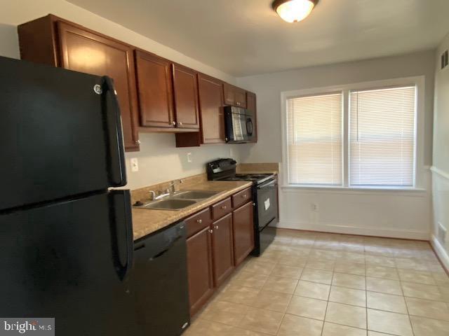 WARFIELD CONDOMINIUMS - Residential Lease