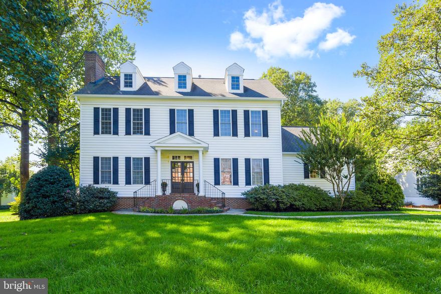 Open House Sunday November 12th 2-4 pm.  Gorgeous 5 BD, 5.5BA Colonial on a flat, 2/3 acre lot with mature trees, on a quiet street in the Oakton school pyramid.  Rare main level primary suite makes living easy. The suite has an attached master bath with dual vanities, jacuzzi tub, large shower, separate water closet and two walk-in closets, PLUS bedrooms on each floor and an unfinished rec room/office/6th bedroom over the garage, there are many options for living, working and hosting long terms guests.  There over 860 sq ft of unfinished space on the second level to easily transform into a home office or guest suite-take a look at the floor plans! The recently renovated kitchen features Sub-Zero fridge, Wolf range top, stainless steel appliances, designer porcelain tile floor, and Caesarstone countertops. Sit at the island, relax in a cozy chair next to the kitchen fireplace or do homework at the kitchen table while the chef is preparing meals in this gourmet kitchen. The family room has a handsome coffered ceiling, a stone mantel and a gas fireplace. Step onto the screened in porch from the family room to enjoy the peaceful, lush backyard with dappled sunlight.  The main level also features hardwood floors in the formal living room and dining rooms, 3 gas fireplaces, crown dentil moldings, and 10’ ceilings. Upstairs are 3 spacious bedrooms, 2 full bathrooms and a “loft” hang out or playroom area. Bedrooms 2 and 3 are connected by a Jack & Jill bathroom. The 4th bedroom upstairs has its own full bathroom. The finished walkout basement has the 5th bedroom and full bath, a jumbo sized rec room, the fourth fireplace, and a huge storage room. There is a large 330 sq ft unfinished room over the garage which can easily be finished into a home office, guest space or bonus room. There is a full bath at this end of the house to make it easy for guests to have a private space, apart from the rest of the home.  Large 2 car garage is just a few steps to the kitchen through the mudroom. Terrific location! Close to Oakton shopping, the Town of Vienna, Vienna Metro, Rt 123, I-66 Hwy, & Rte 50 yet away from the hustle and bustle!