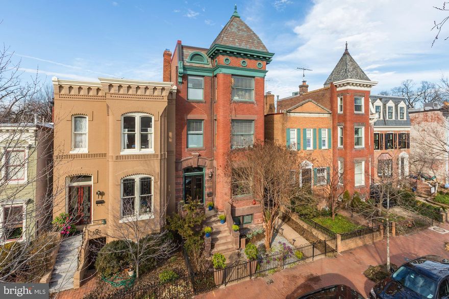 SIGNIFICANT PRICE REDUCTION ON ICONIC CAPITOL HILL RESIDENCE! Over 6,500 square feet of exquisitely-designed living and entertaining space located on the Hill's most desirable street just steps from the US Capitol complex.  A truly grand residence suitable for large receptions and intimate gatherings.  No detail overlooked.  Chef's kitchen (with large pantry) and main-level family room.  Gracious side porch and rear courtyard garden.  Six bedrooms in main residence, featuring a palatial Master Bedroom Suite with walk-in steam shower and super-sized walk-in closet.  Beautiful two bedroom two bathroom English basement rental unit with private side entrance adds SUBSTANTIAL INCOME POTENTIAL!  Off-street parking.  It doesn't get any better than this...