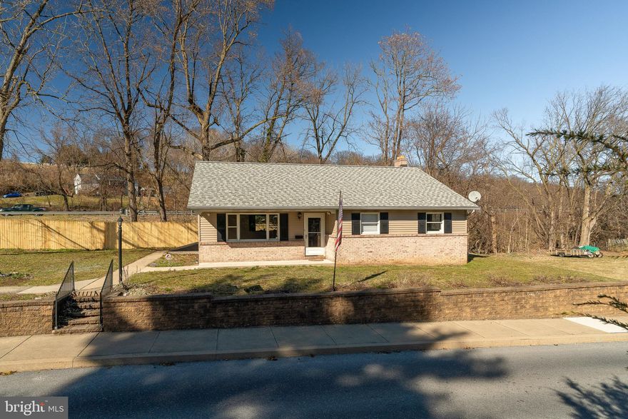 Completely remodeled and updated one-floor living in Columbia, on the north side of the boro, in a lovely cozy neighborhood.  2-Bedroom, plus a clever multi-use Bonus Room for Nursery, library, office, sitting room or hobby room, 1.5 bath, 2500+ sq ft of living space, Home is move-in ready, on a corner lot of .22 acres, partially fenced with privacy fencing. Fully hardscaped, off-street parking and street stairs with quaint lamp post offer ample parking and convenience.  Enter a large living room with new flooring, crown molding and bright sunny windows. Sunshine flows into the upgraded Kitchen with island, breakfast bar, ample dining area, warmly polished cabinets, crown molding, new flooring, stainless sink, granite countertops, new tile backsplash and new appliances. Bedrooms have wonderful wooden closet doors, matching wood trim around windows. Family Bath has soothing shower, recent upgrades and new flooring. Comfortable deck and porch, inviting natural light, with potential for family meals/games/entertaining or just sitting in a comfy chair.  Spacious lower level with half bath privy will spark ideas for expanding entertainment space and family activities. Basement walls are painted with Loctite; floors are epoxy painted and ready for you to move that ping-pong table in thru the bilco door! Mature landscaping and flower beds brighten up this shiny, sunny home. Plenty of space for your flowering imagination, with an attractive, exterior decorative wall inviting your horticultural talent. Easy access to York, Lancaster, Harrisburg, Washington DC, Baltimore, the mighty Susquehanna River, historic sites, community events, and sporting events.